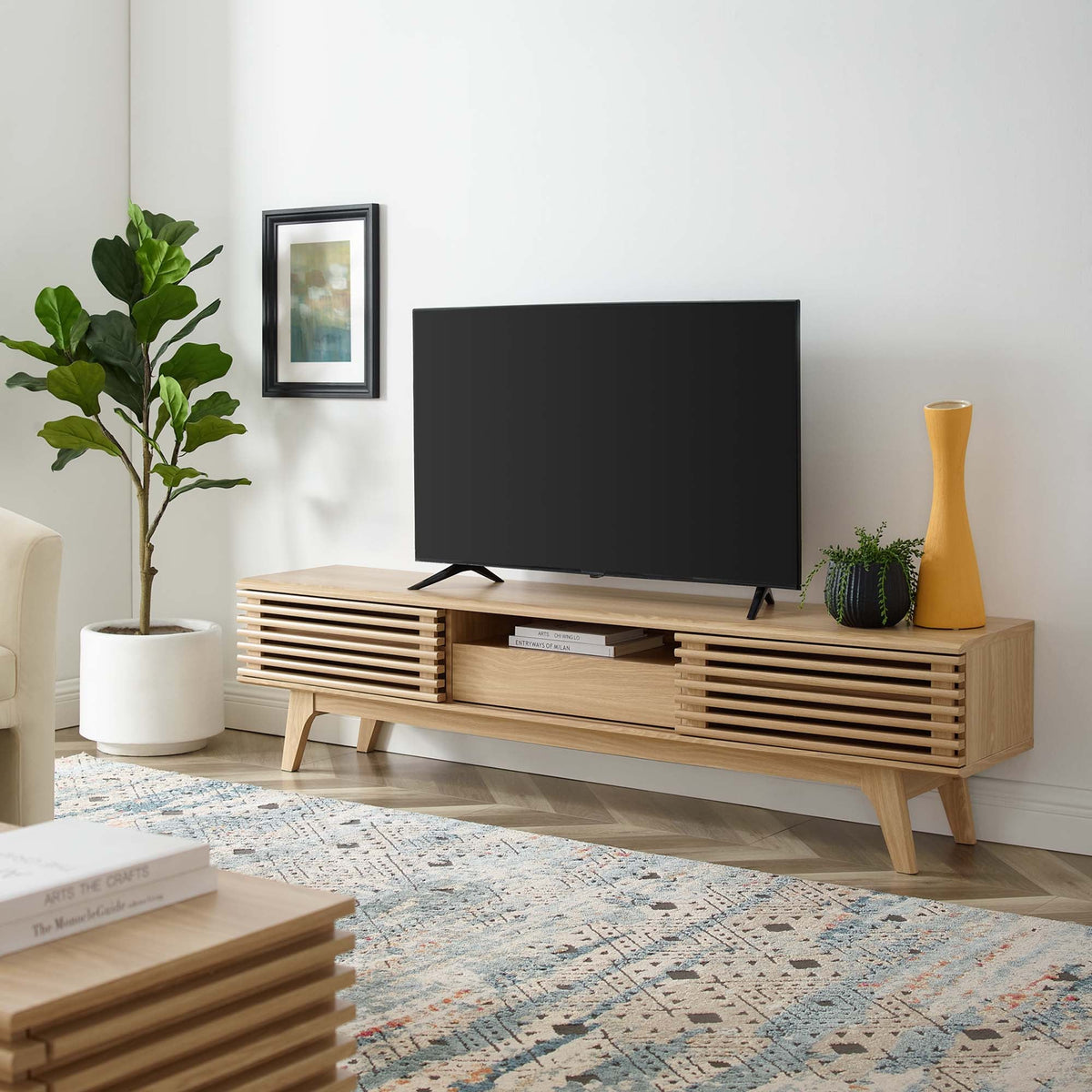 Render TV Stand by Modway in light wood with slatted panels and black legs supporting a TV on Tampa Home & Garden Store