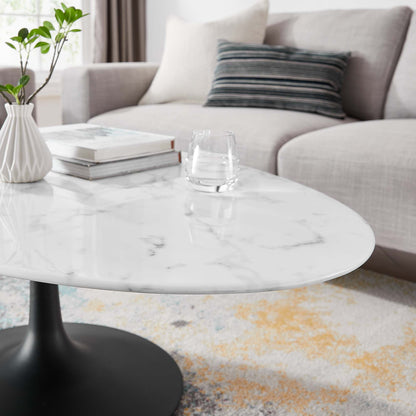 Lippa 48in oval faux marble coffee table with black pedestal base in living room on Tampa Home & Garden Store