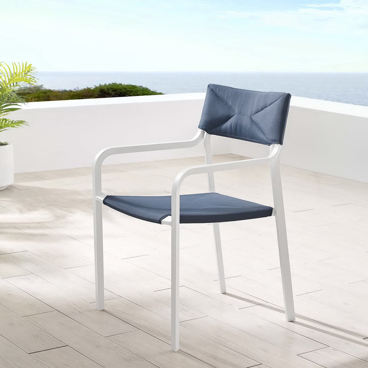 Raleigh Stackable Outdoor Patio Aluminum Dining Armchairs pair with navy blue cushions on Tampa Home & Garden Store