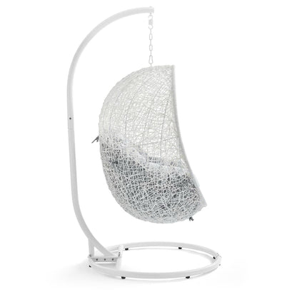 White outdoor Sunbrella swing chair with stand, circular base and woven lattice seating on Tampa Home & Garden Store