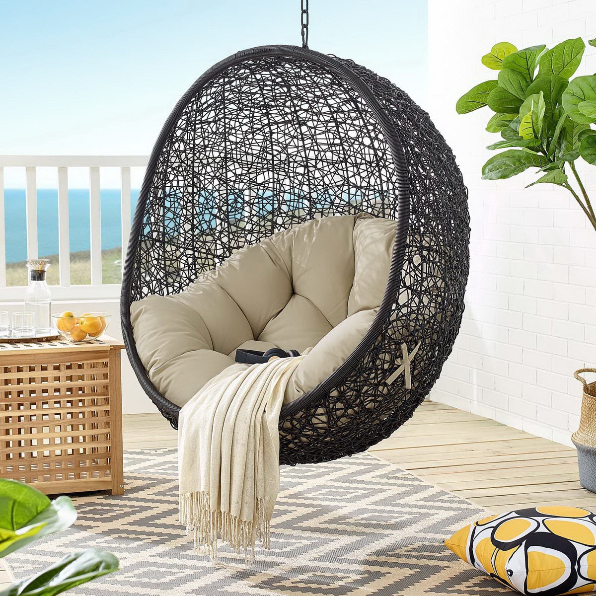 Encase Swing Outdoor Patio Lounge Chair by Modway with beige cushions and black woven rattan on Tampa Home & Garden Store