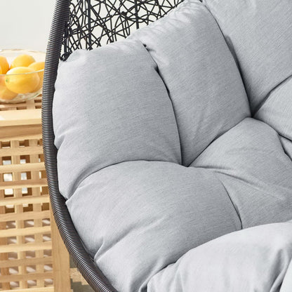 Encase Sunbrella Swing Outdoor Lounge Chair with gray cushions and dark woven frame on Tampa Home & Garden Store