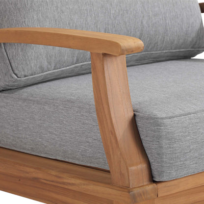 Marina outdoor teak rocking chair armrest with grey cushion on Tampa Home and Garden Store