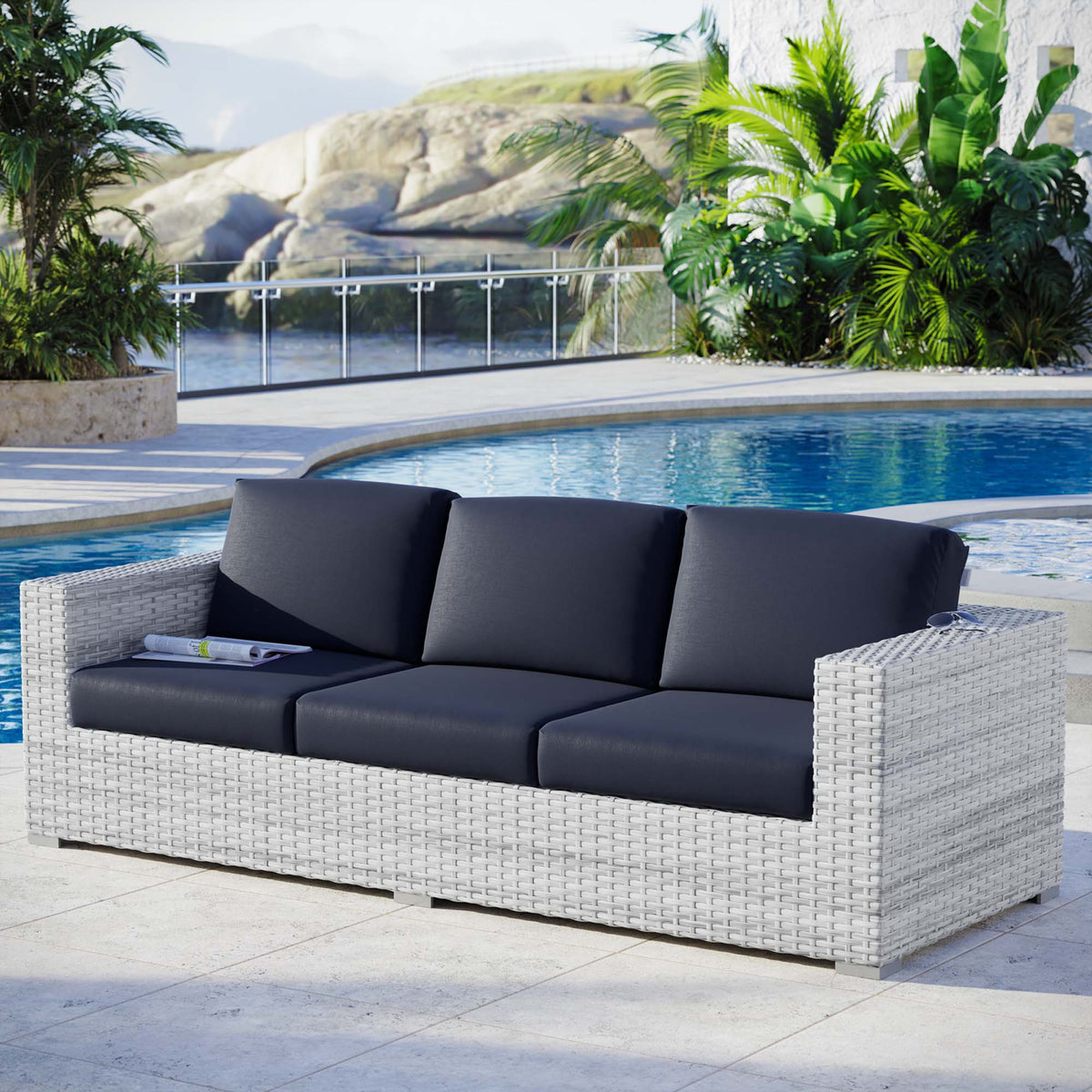 Convene outdoor patio sofa with dark charcoal cushions on light gray woven wicker frame on Tampa Home & Garden Store