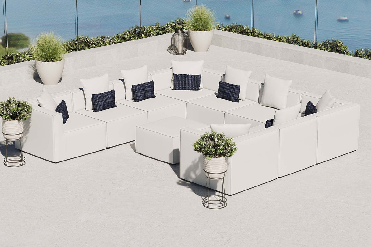 Saybrook 10-Piece Outdoor Sectional Sofa in white with navy cushions on Tampa Home & Garden Store