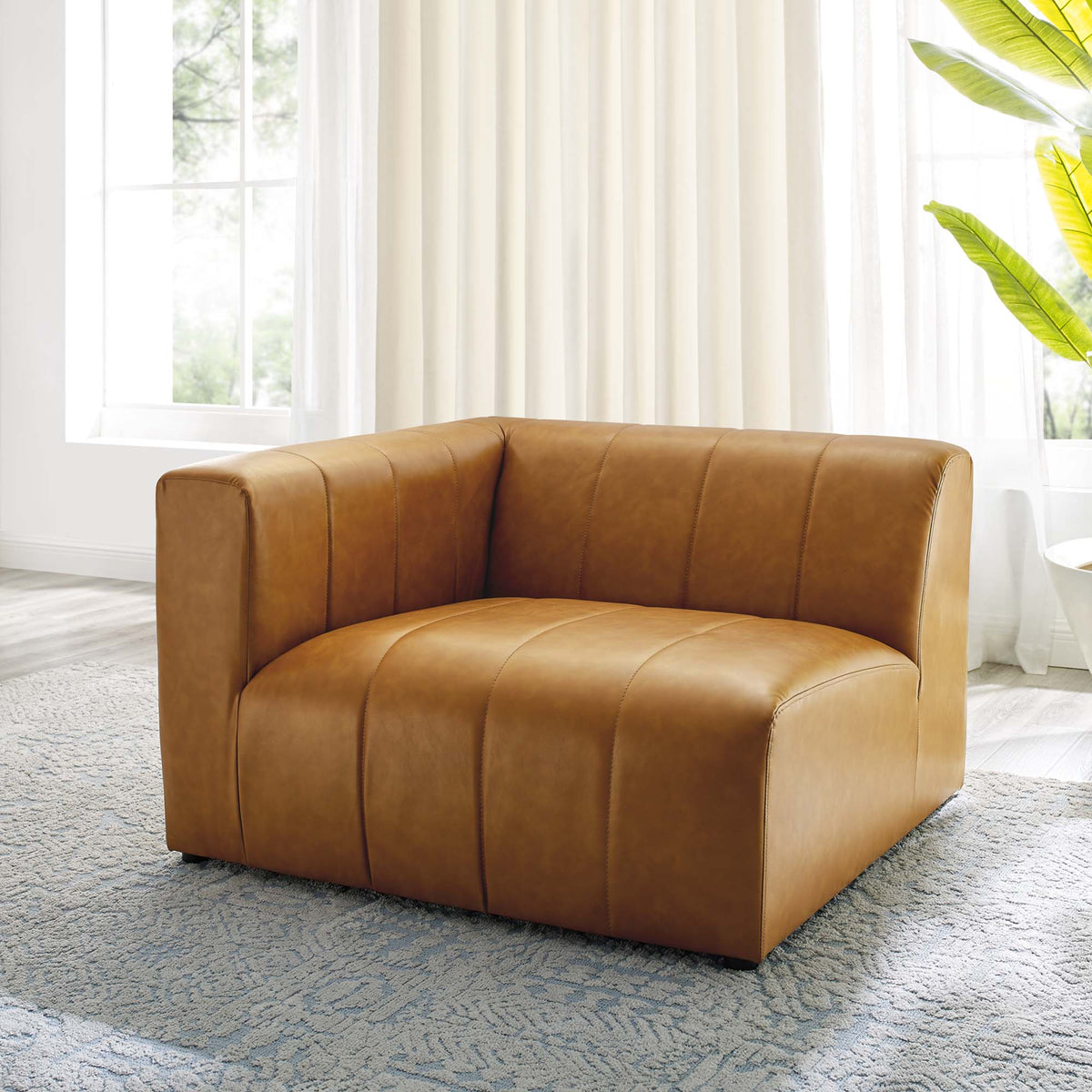 Bartlett vegan leather left-arm chair in warm tan with stitched panels in a living room on Tampa Home & Garden Store