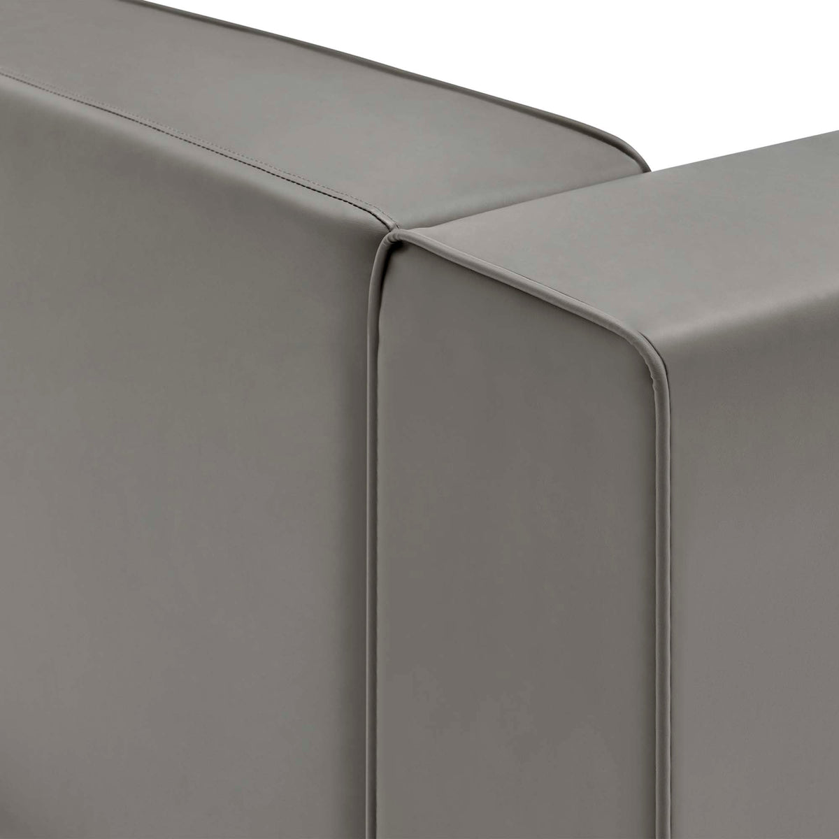 Mingle vegan leather right-arm chair in gray close-up of seam details on Tampa Home & Garden Store