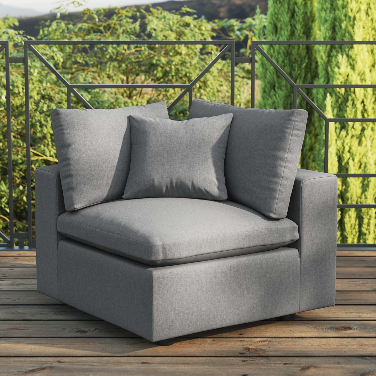 Commix overstuffed outdoor patio corner chair with gray cushions and dark metal frame on Tampa Home & Garden Store