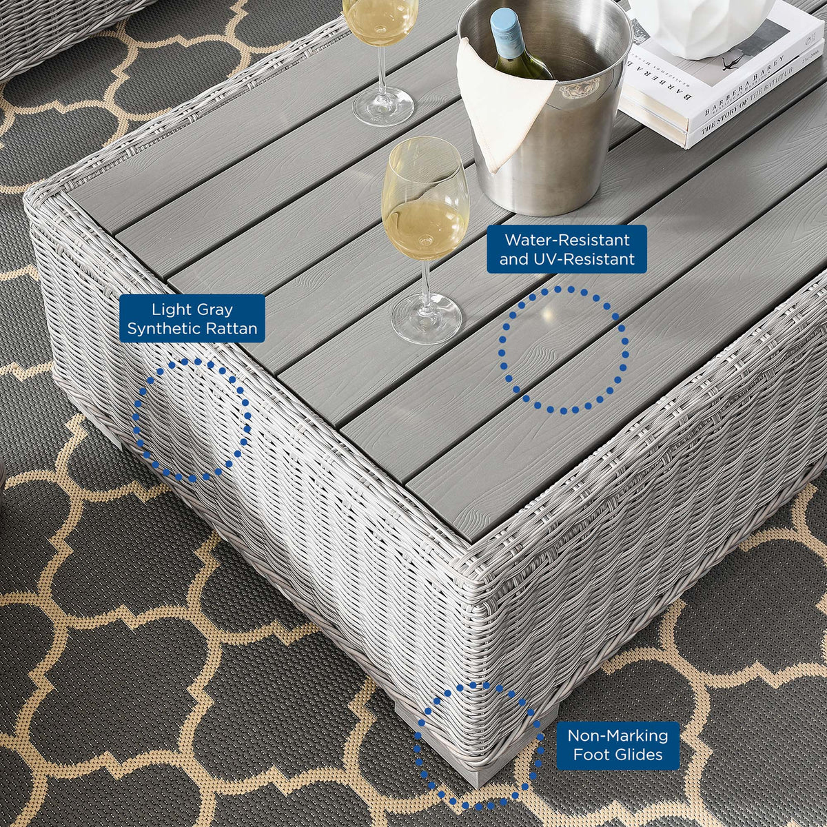 Conway 4-Piece outdoor wicker rattan set in light gray with slatted coffee table on rug on Tampa Home & Garden Store