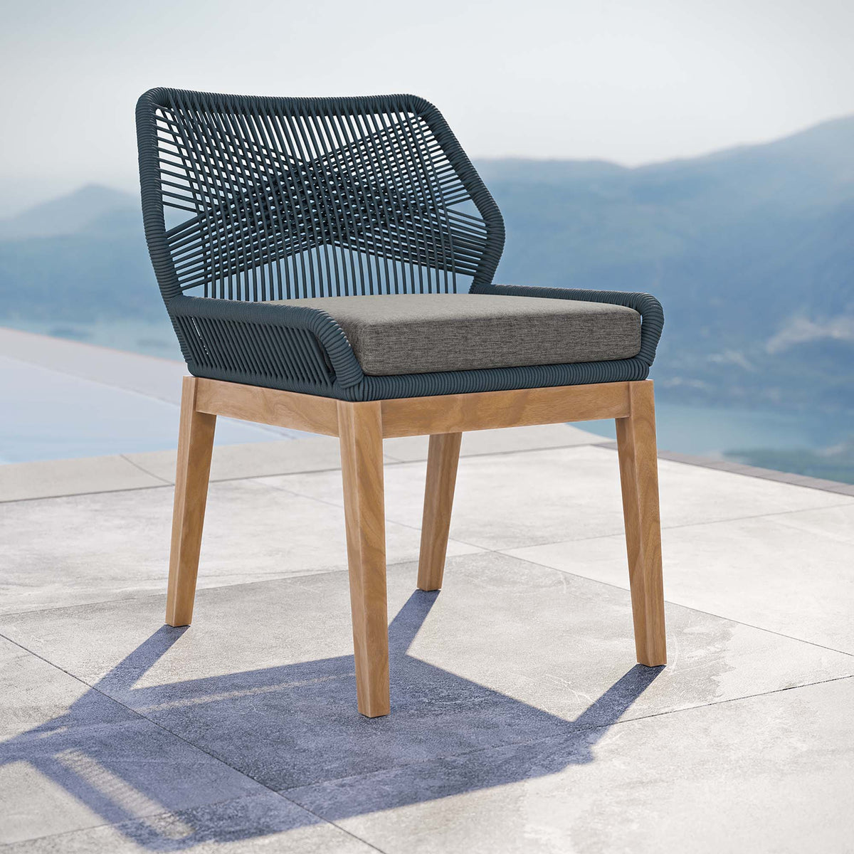Wellspring Outdoor Patio Teak Wood Dining Chair with black woven rope back and gray cushion on Tampa Home & Garden Store