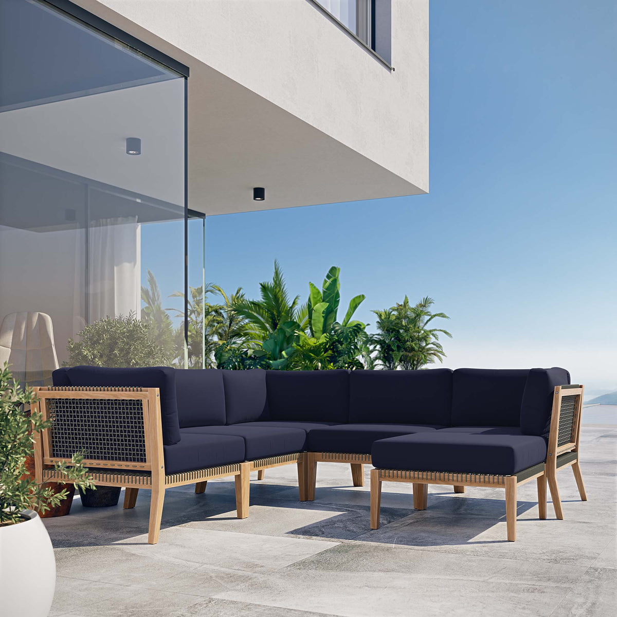 Clearwater 6-Piece outdoor teak wood sectional sofa with navy cushions and woven sides on Tampa Home & Garden Store