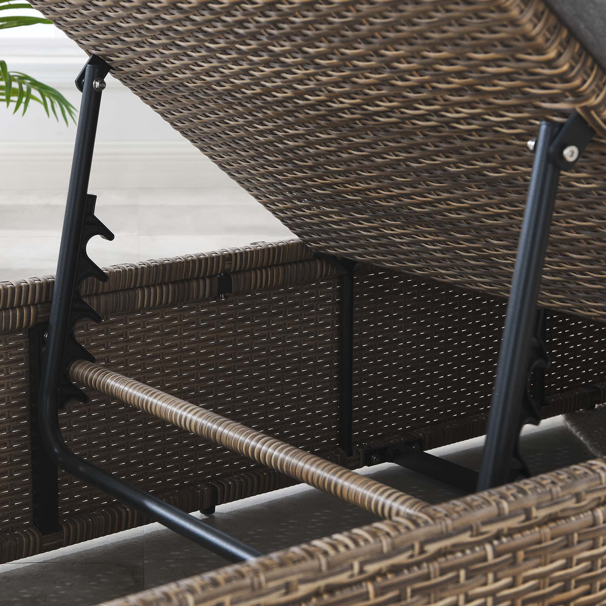 Convene outdoor patio chaise lounge chair with brown wicker and black metal frame on Tampa Home & Garden Store