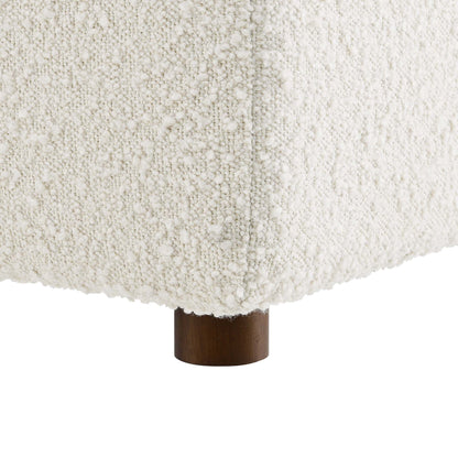 Armless boucle fabric chair with down-filled overstuffed cushion in cream and wood base on Tampa Home & Garden Store