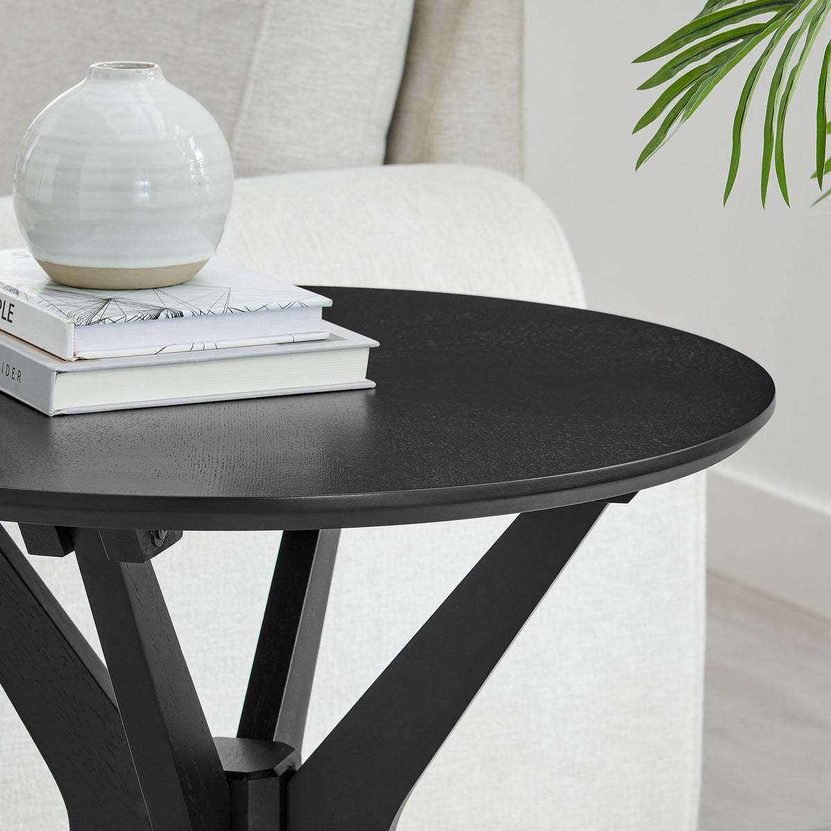 Crossroads 24in round wood side table by Modway, black crisscross legs with vase and books on top on Tampa Home & Garden Store