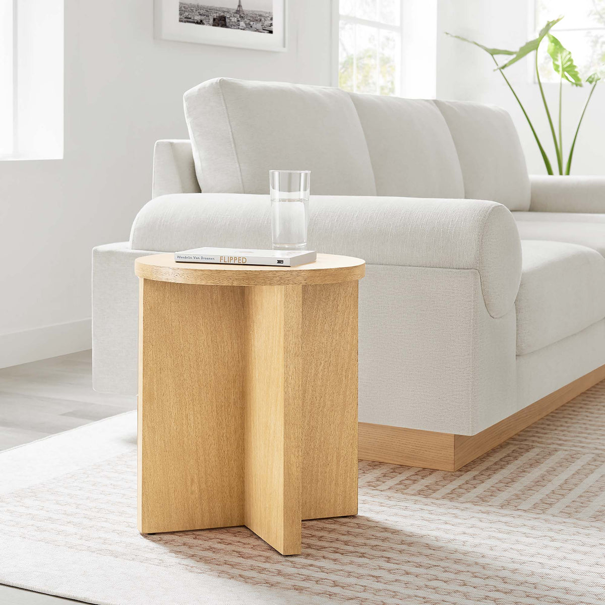 Silas Round Wood Side Table by Modway, natural wood finish beside a light gray sofa on Tampa Home & Garden Store