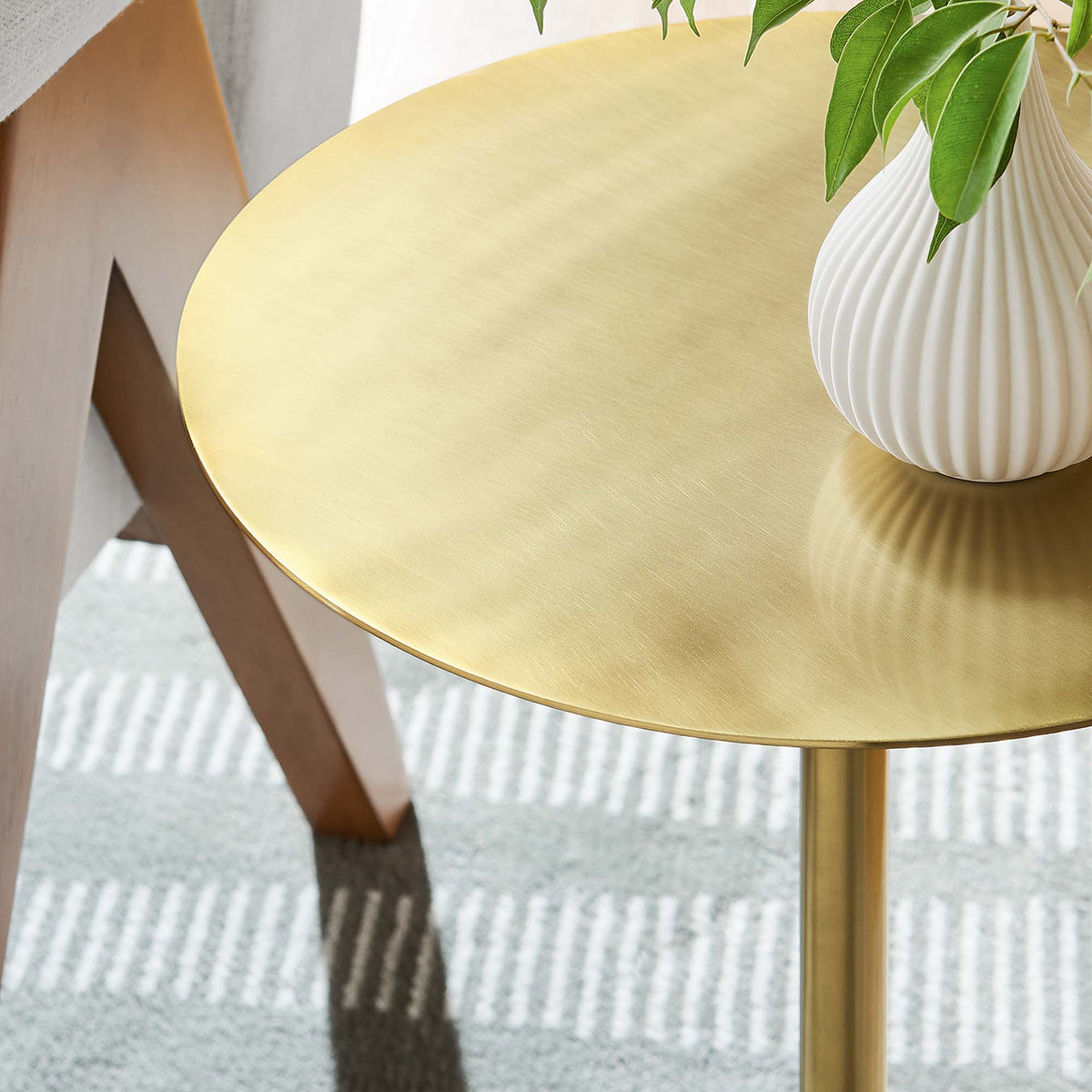 Aliza round side table by Modway; gold brushed top with white ribbed vase and green leaves on Tampa Home & Garden Store