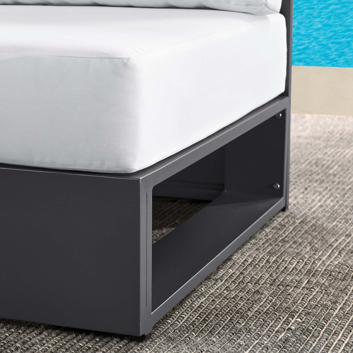 Tahoe outdoor armless chair with white cushion and black powder-coated aluminum frame on Tampa Home & Garden Store