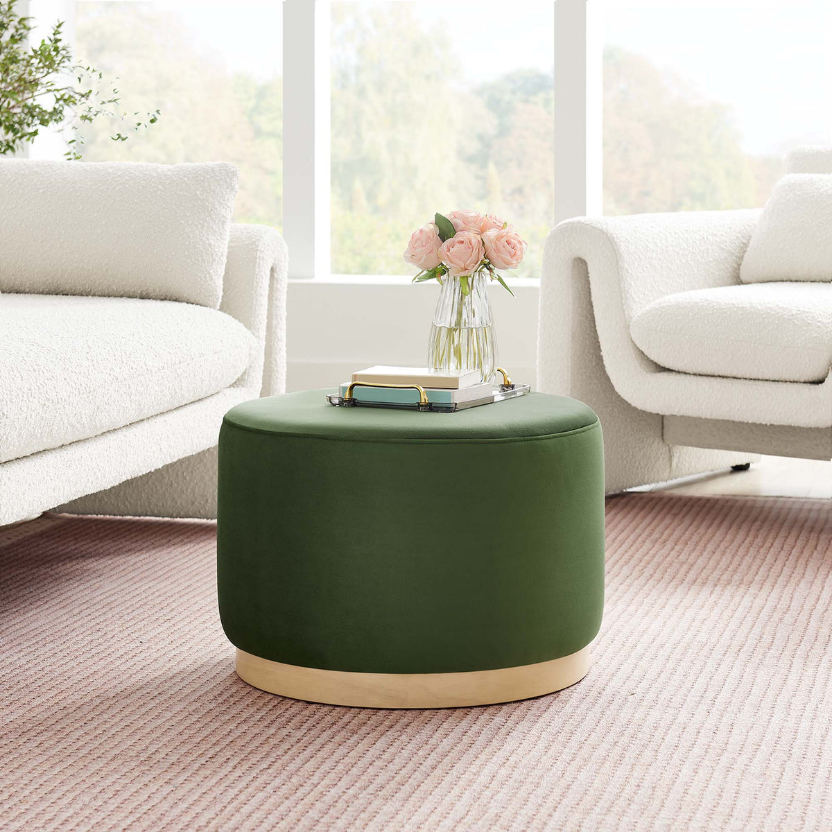 Tilden Large Round Performance Velvet Ottoman in green velvet between two white boucle chairs on Tampa Home & Garden Store