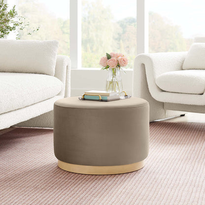 Tilden large round velvet ottoman in taupe with gold base by HouseOfZazla in a living room on Tampa Home & Garden Store