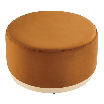 Tilden large round velvet ottoman in amber orange with light wood base on Tampa Home & Garden Store
