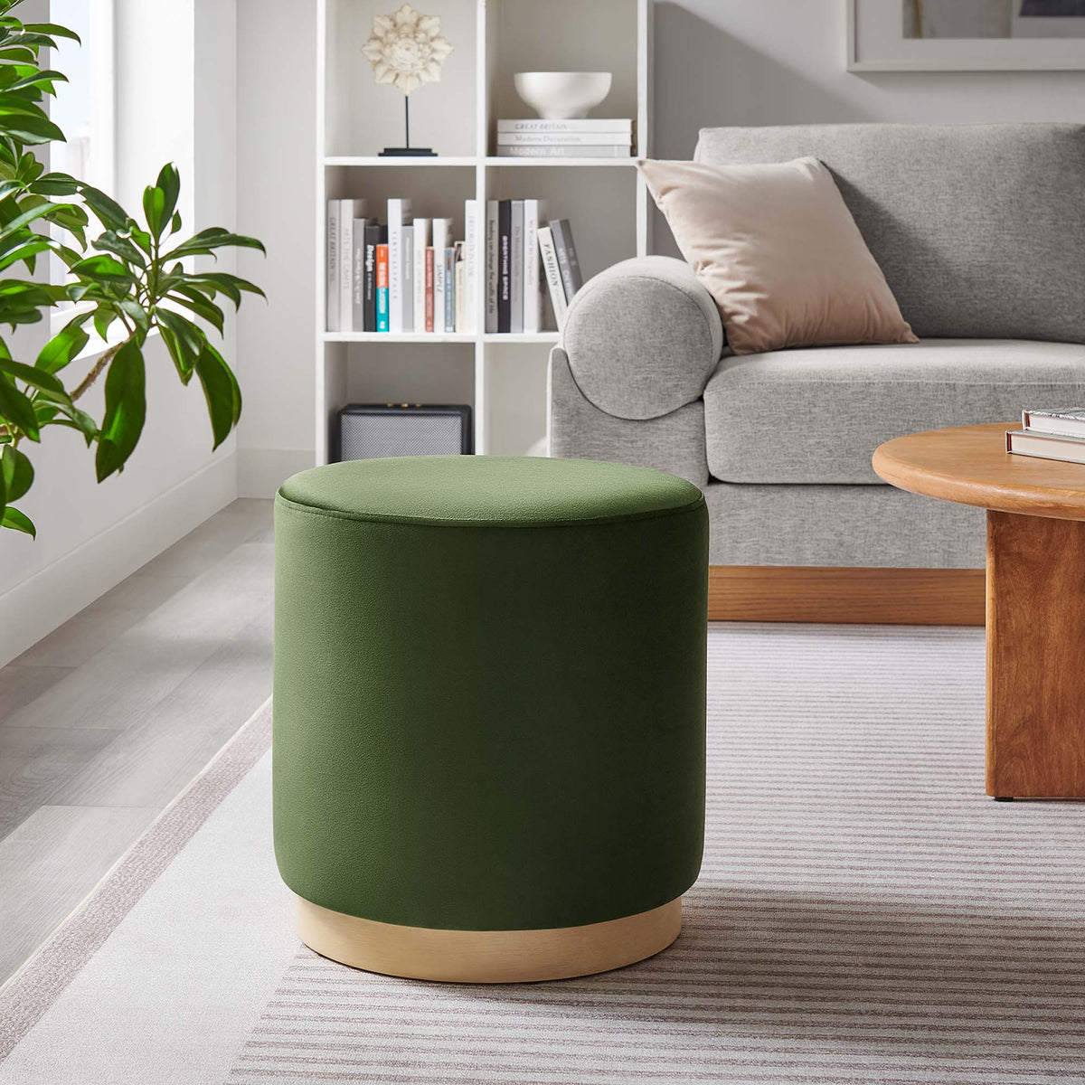 Tilden 16-inch round velvet ottoman by Modway in green with wood base in a modern living room on Tampa Home & Garden Store