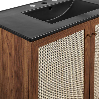 Soma bathroom vanity with black countertop and natural wood cabinet with cane-front panels on Tampa Home & Garden Store