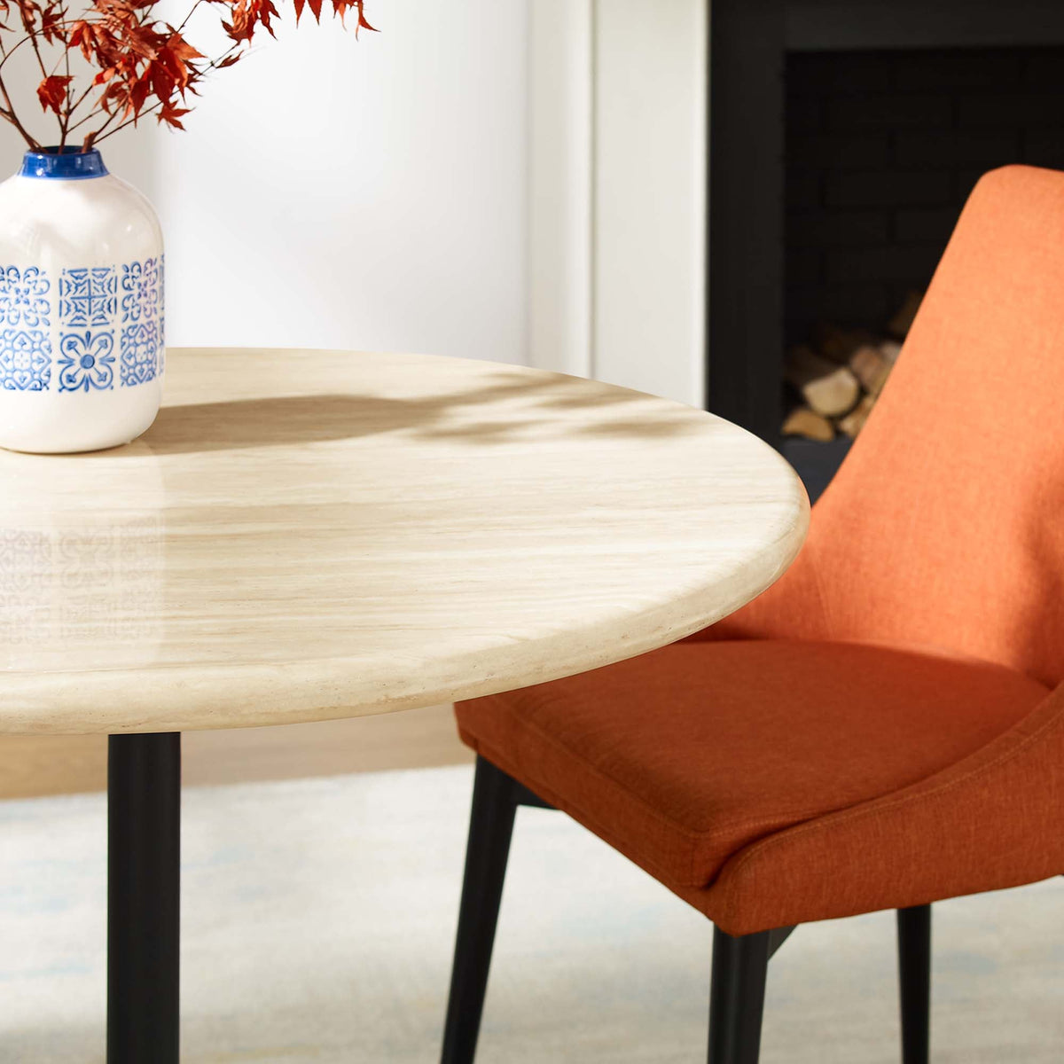Lippa Round Faux Travertine Dining Table by Modway, light wood top with black legs on Tampa Home & Garden Store