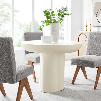 Caspian 40in round dining table with white pedestal base in a bright room with gray chairs on Tampa Home & Garden Store
