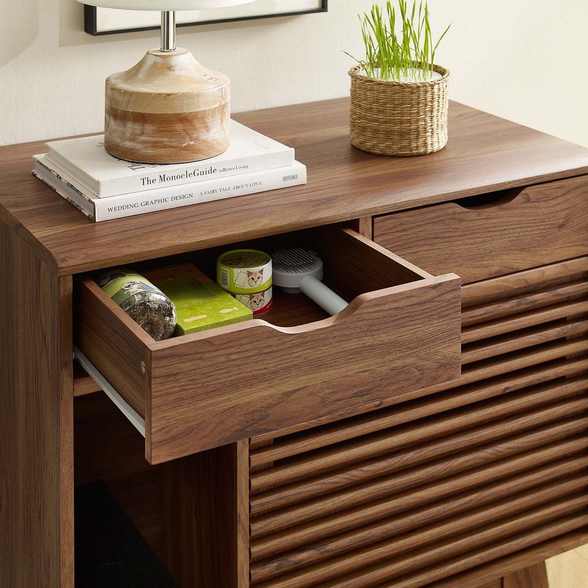 Render Cat Cabinet by Modway wooden decor console with stacked books and woven plant basket on Tampa Home & Garden Store