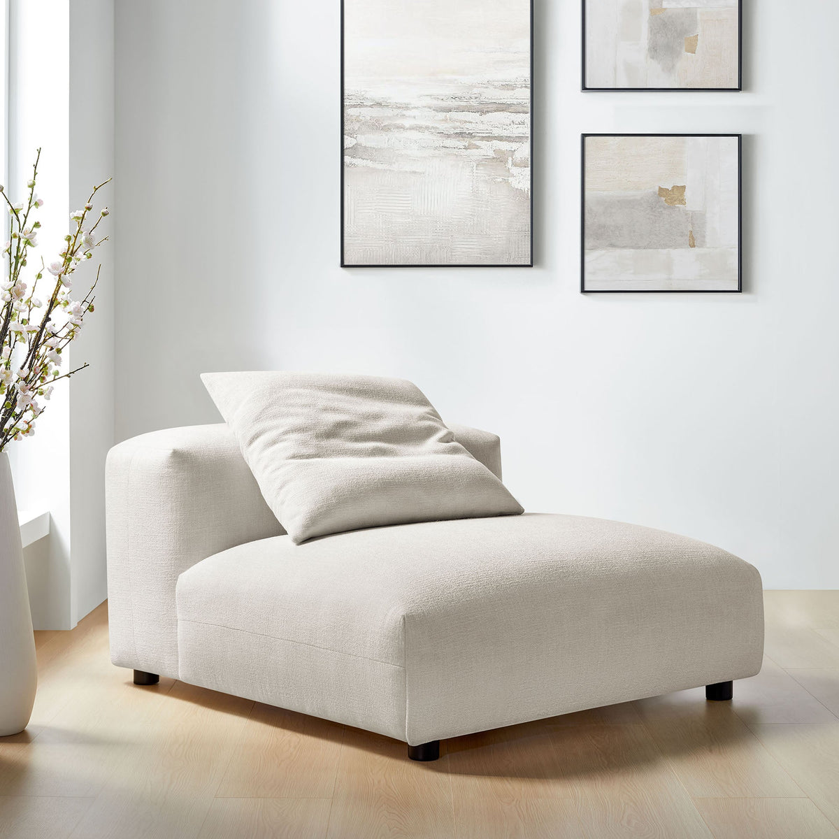 Solace modular armless upholstered chair in neutral beige fabric with rounded edges and low legs on Tampa Home & Garden Store