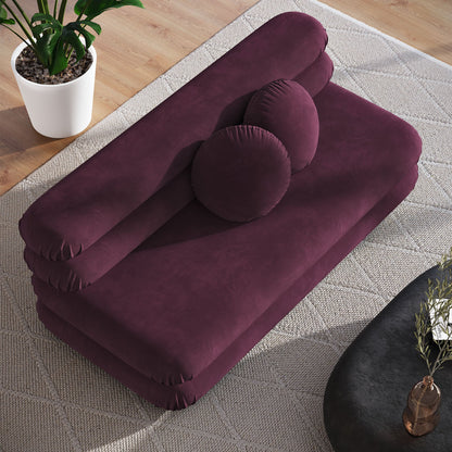 Jubilee modular armless loveseat in deep plum performance velvet with plush bolster pillows on Tampa Home & Garden Store