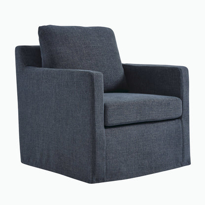 Serene fabric slipcovered swivel armchair in dark blue-gray upholstery by HouseOfZazla on Tampa Home & Garden Store