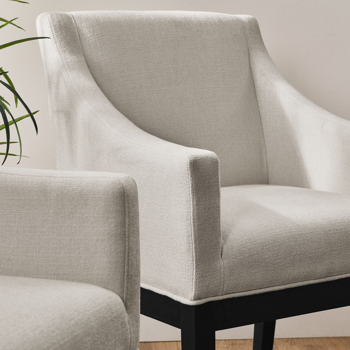 Alton Fabric Upholstered Dining Armchair in light gray fabric with black legs (pair) on Tampa Home & Garden Store