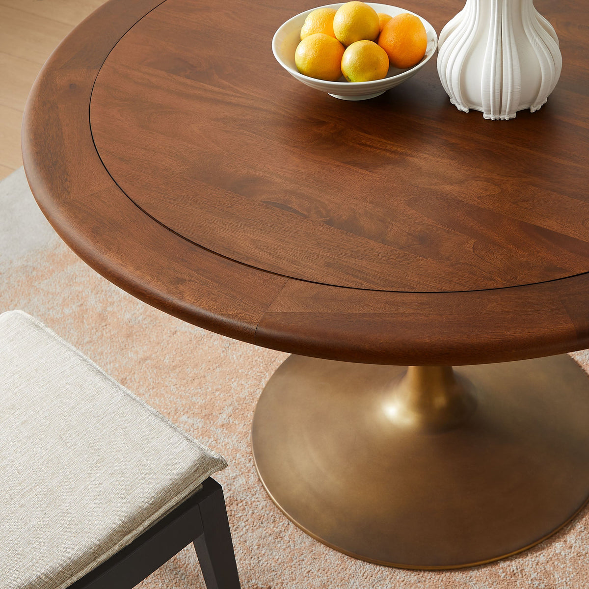 Lippa round dining table solid wood with fruit bowl and white lamp on Tampa Home & Garden Store