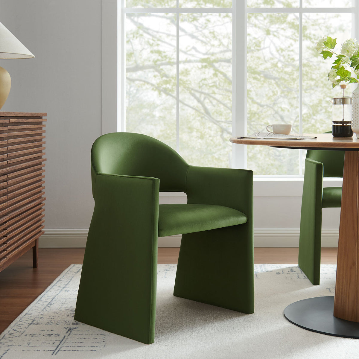 Two green Talia Performance Velvet Dining Armchairs by Modway in a bright dining area on Tampa Home & Garden Store