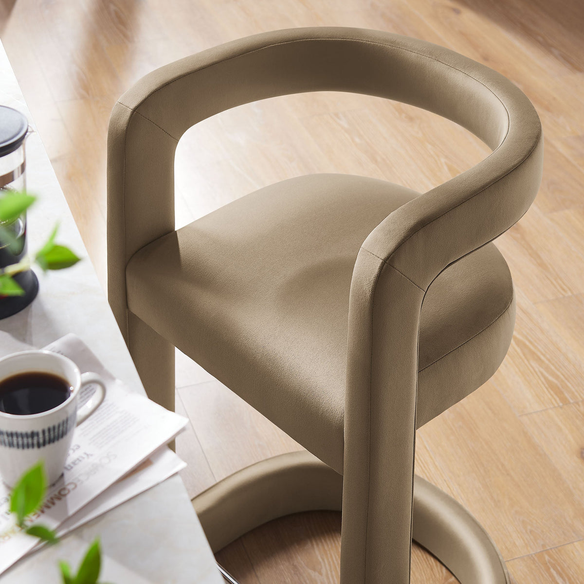Winslow Performance Velvet Counter Stool with taupe upholstery and curved armrests on Tampa Home & Garden Store
