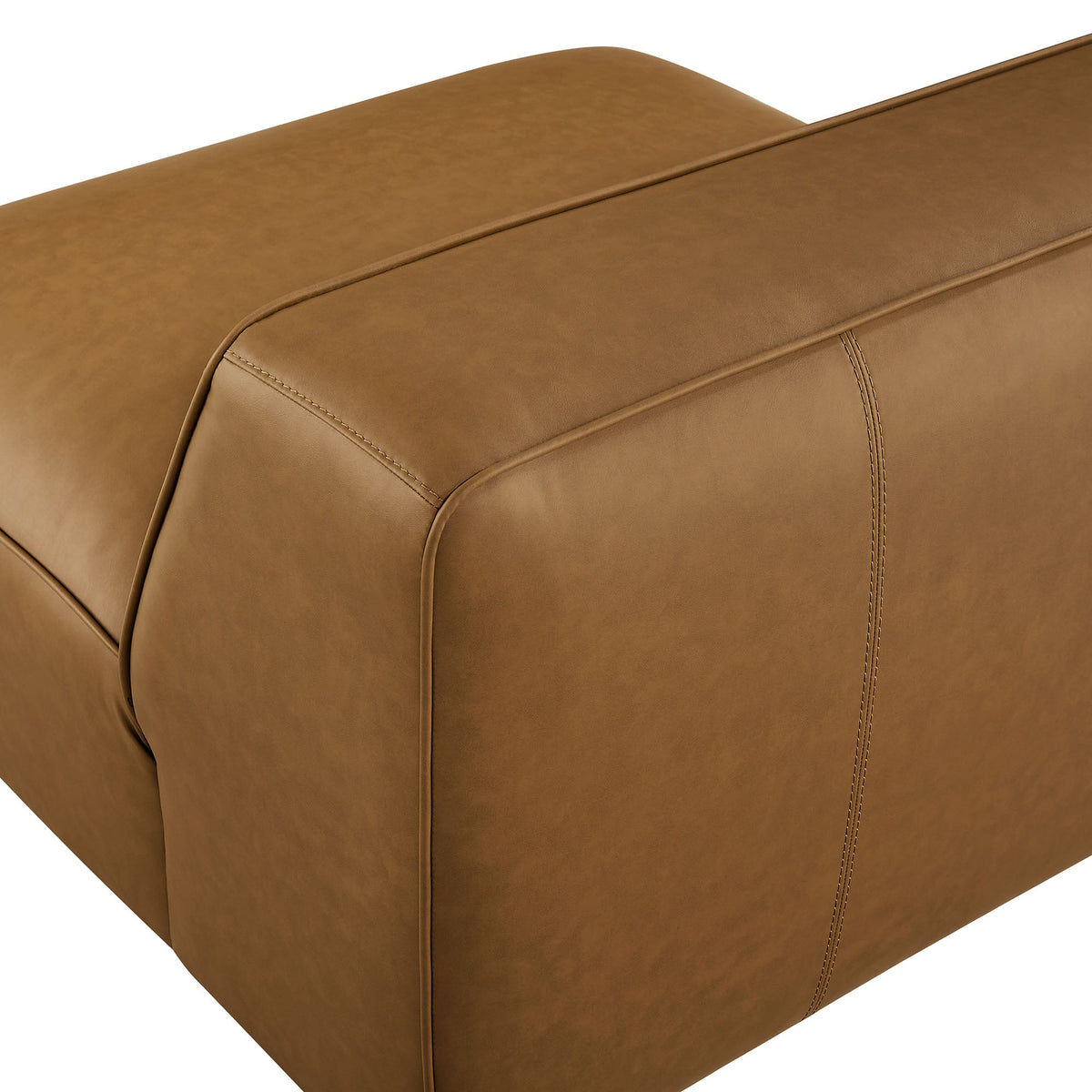 Auren upholstered vegan leather modular armless chair in tan caramel with stitched seams on Tampa Home & Garden Store