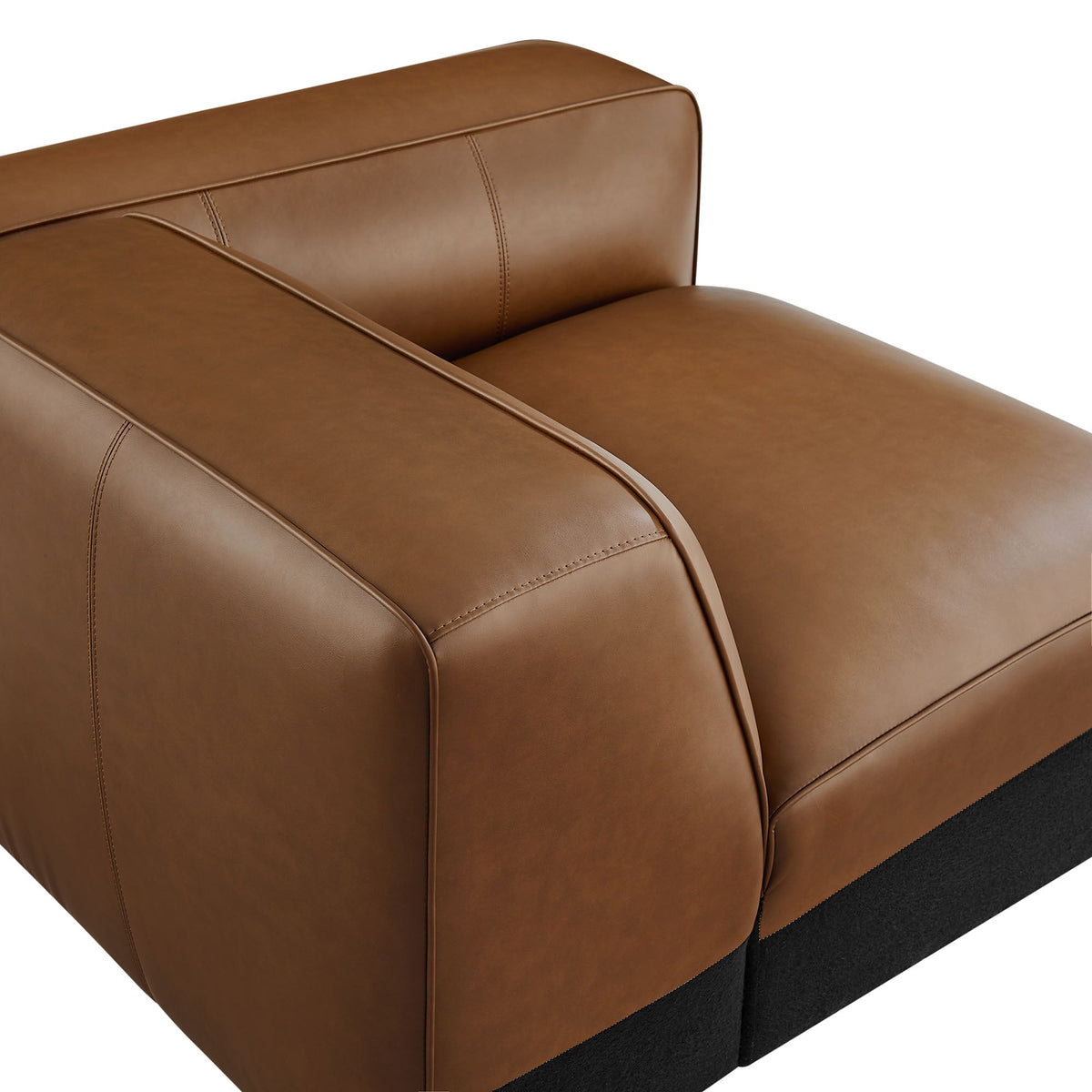 Auren vegan leather modular right armchair close-up in caramel brown with piping on Tampa Home & Garden Store
