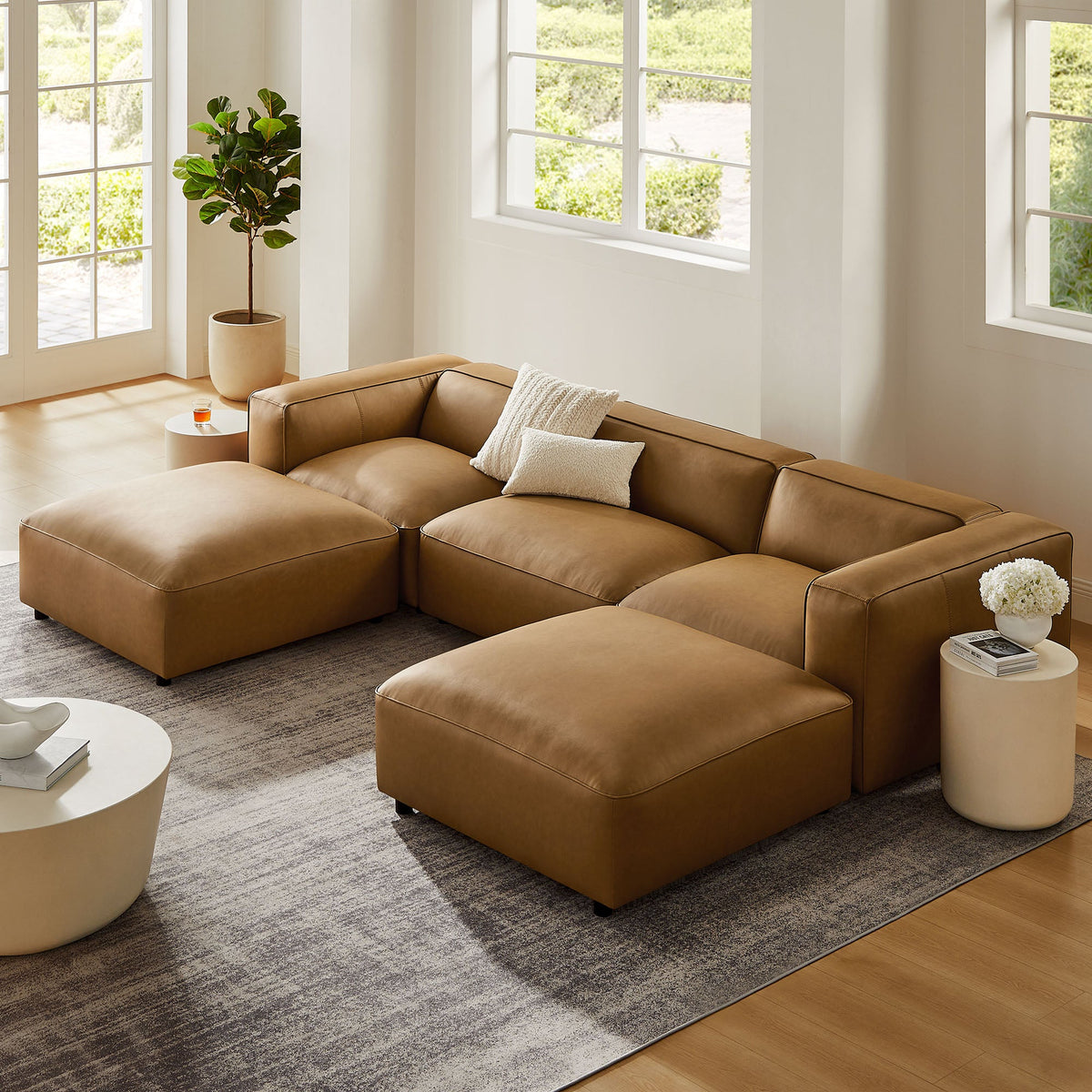 Auren 5-Piece upholstered vegan leather modular U-shaped sofa in tan with white cushions on Tampa Home & Garden Store