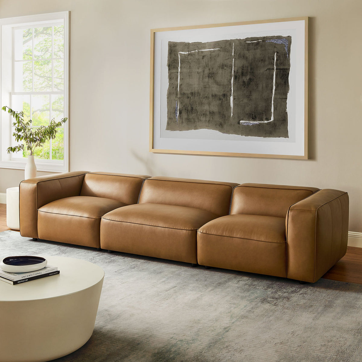 Auren 3-Piece vegan leather modular sofa tan brown in a modern living room on Tampa Home & Garden Store