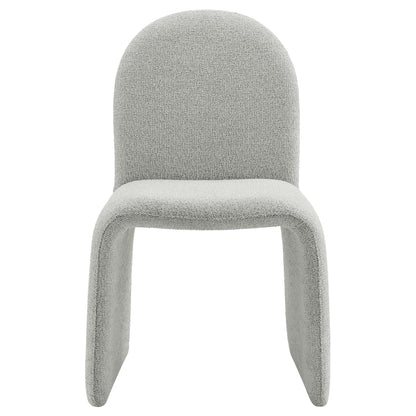 Junia Boucle Upholstered Armless Dining Chair in gray boucle fabric with curved sled legs on Tampa Home & Garden Store