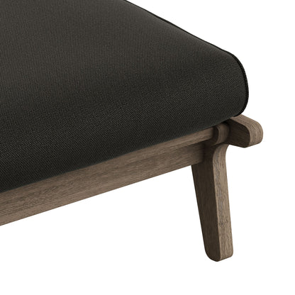 Saratoga outdoor teak wood chair and ottoman set with dark charcoal woven cushion, close-up of teak arm and base on Tampa Home & Garden Store