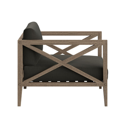 Northlake outdoor teak armchair with dark cushion and lattice crisscross back on Tampa Home & Garden Store