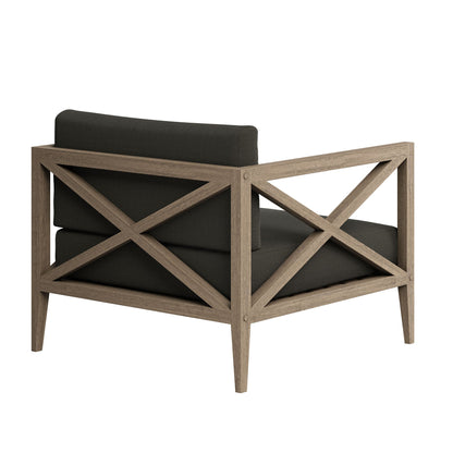 Northlake outdoor teak armchair with dark cushion and crisscross teak frame on Tampa Home & Garden Store