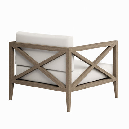 Northlake outdoor teak armchair with beige cushion and crisscross lattice frame on Tampa Home & Garden Store