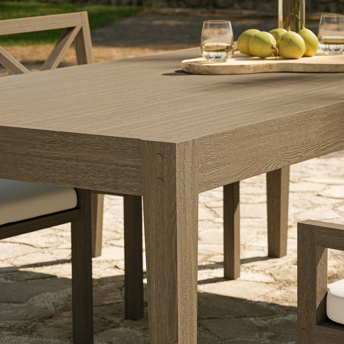 Northlake 83in rectangular outdoor teak dining table by Modway with visible wood grain on a patio on Tampa Home & Garden Store