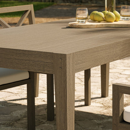 Northlake 83in rectangular outdoor teak dining table by Modway with visible wood grain on a patio on Tampa Home & Garden Store