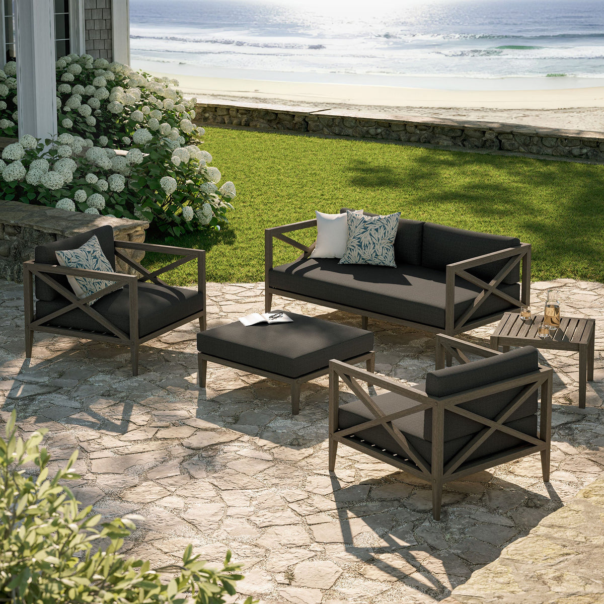 Northlake 5-Piece Outdoor Patio Teak Wood Furniture Set with dark cushions and leaf pillows on Tampa Home & Garden Store