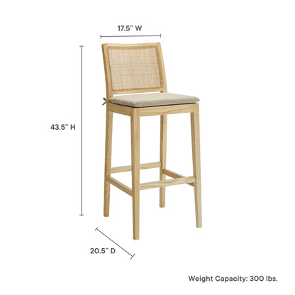 Ovard Wood and Rattan Bar Stool with caned back, natural wood frame, beige cushioned seat on Tampa Home & Garden Store