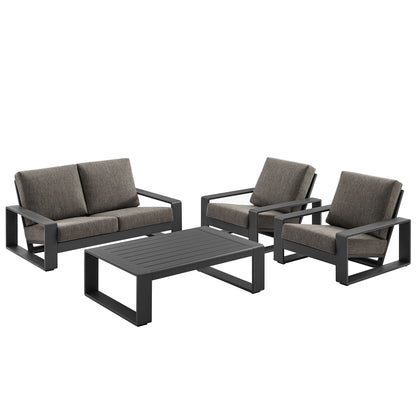 Lirienne 4-Piece aluminum furniture set with black frames and cushions around a table on Tampa Home & Garden Store